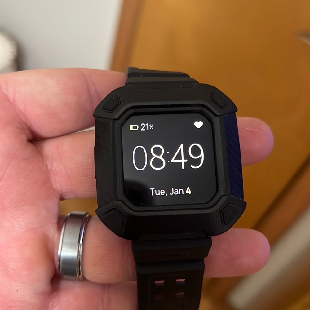 Fitbit Sense with 2 wristbands, charger, and block